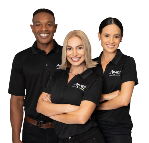 Three smiling Anago Cleaning Systems team members standing together